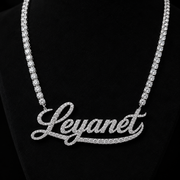 Custom Iced Out Name Necklace on Black Slate Background