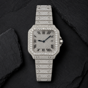 Full Iced Out Stainless Steel Roman Dial Watch on Black Slate