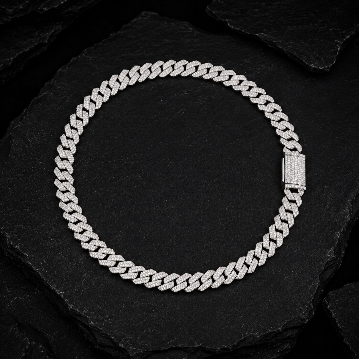Iced Out Moissanite Cuban Link Chain on Black Stone Surface