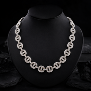 Iced Out Round Link Statement Chain on Black Jewelry Bust