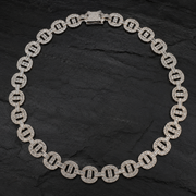 Iced Out Round Link Statement Chain on Black Slate Stone
