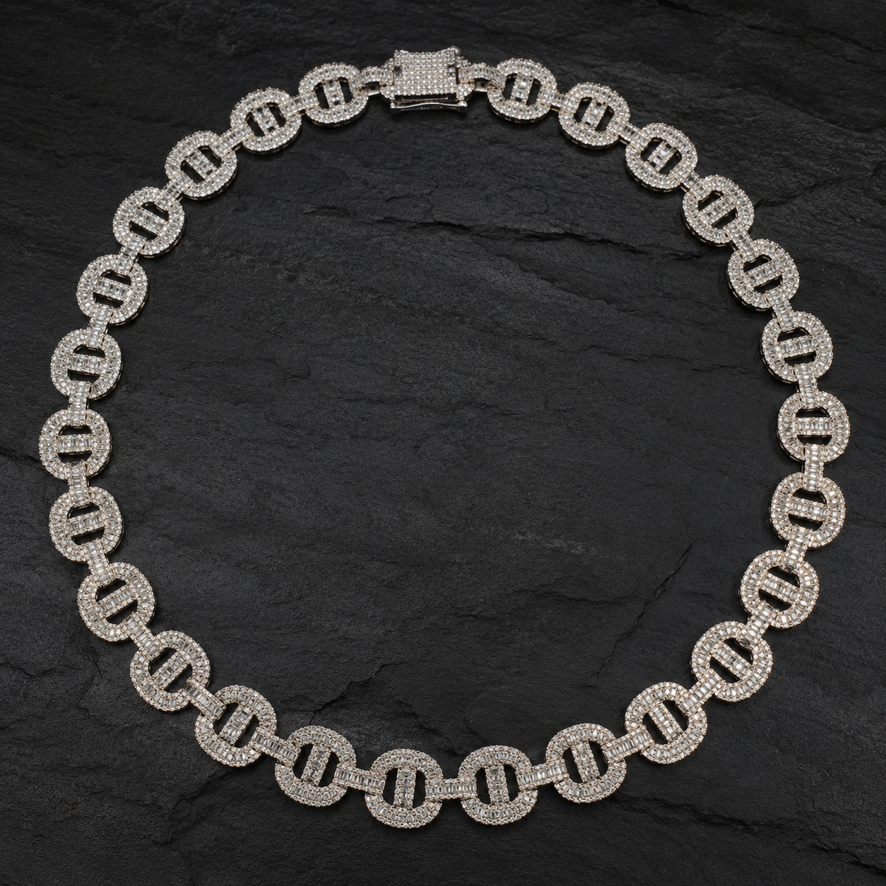 Iced Out Round Link Statement Chain on Black Slate Stone